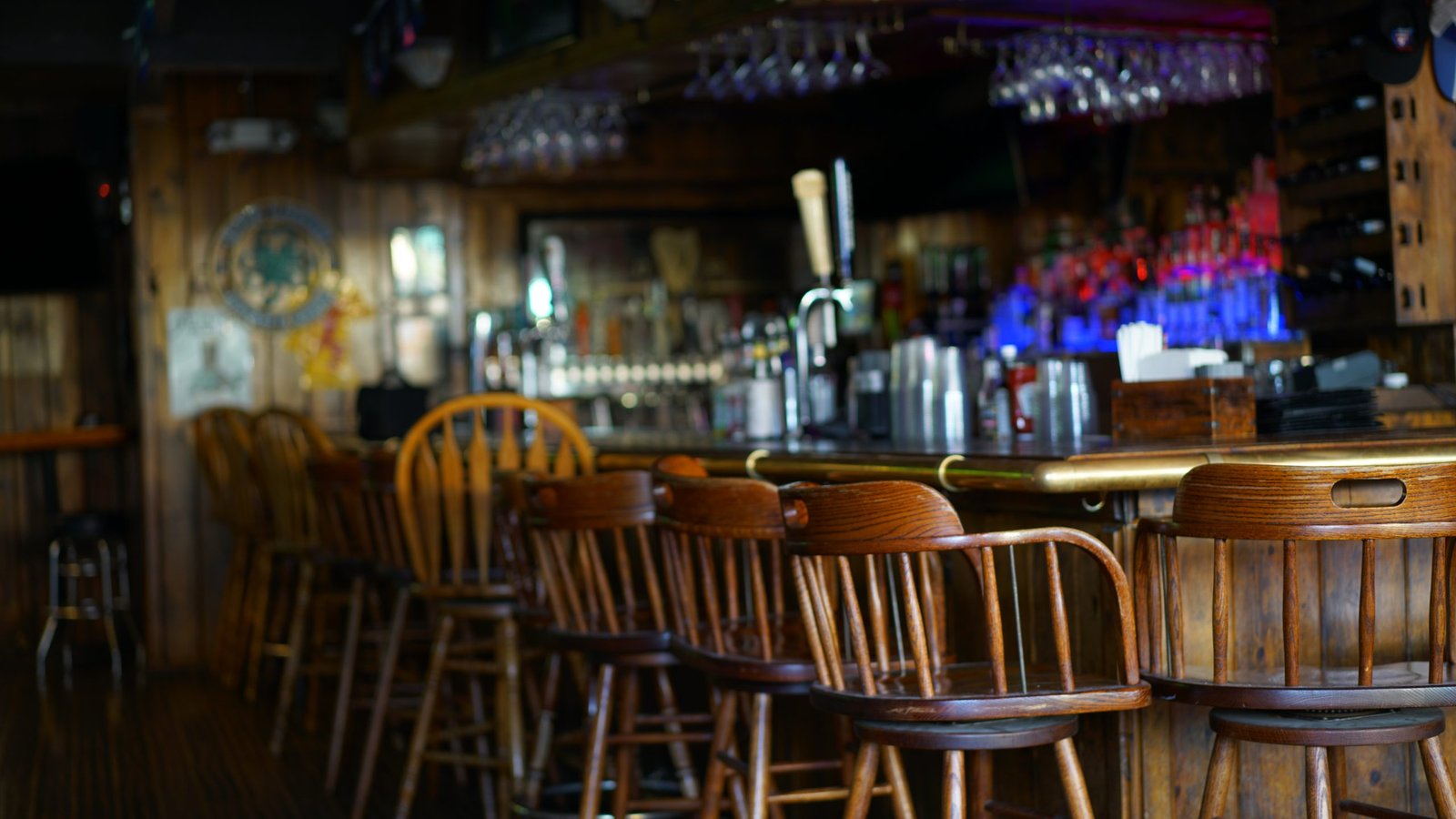 Wooden bar and seating inside Springbok Bar & Grill